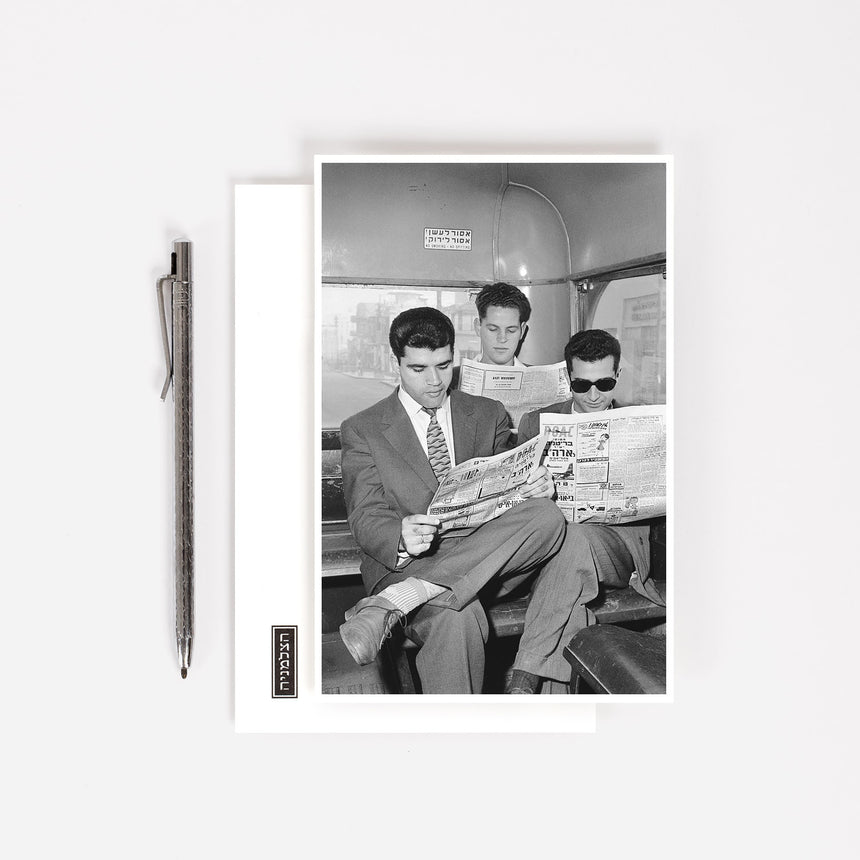 Postcard: The newspaper readers, 1960