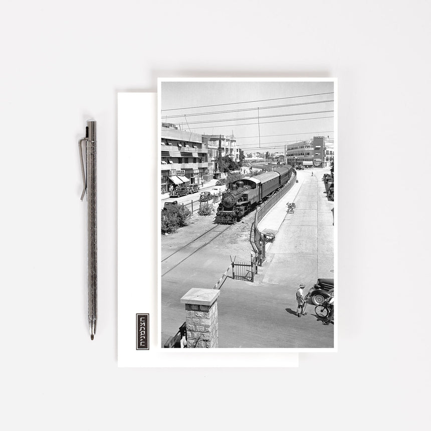 Postcard: The train from Jerusalem to Tel-aviv crossing Allenby st., 1938
